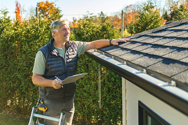 Professional Hail Damage Roof Repair technician working in Bethune, CO